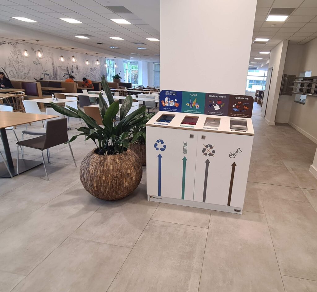 Image of UniSan bins in Microsoft offices, as part of partnership with Cornelius Design to Print 